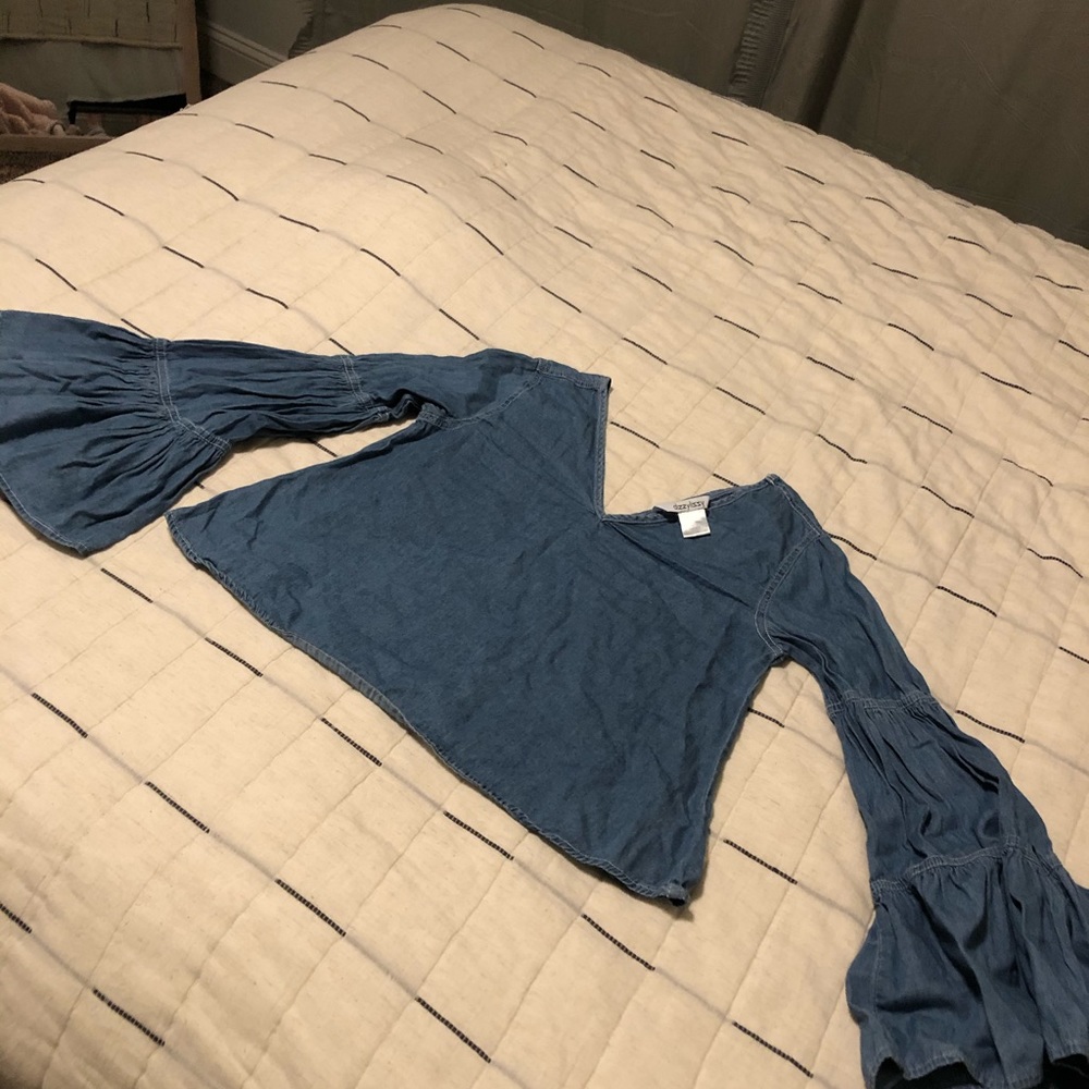 Bell sleeved top